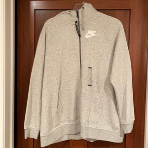 Heather gray, women’s Nike zip-up hoodie. Brand new with tags